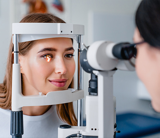 Young women getting an eye exam